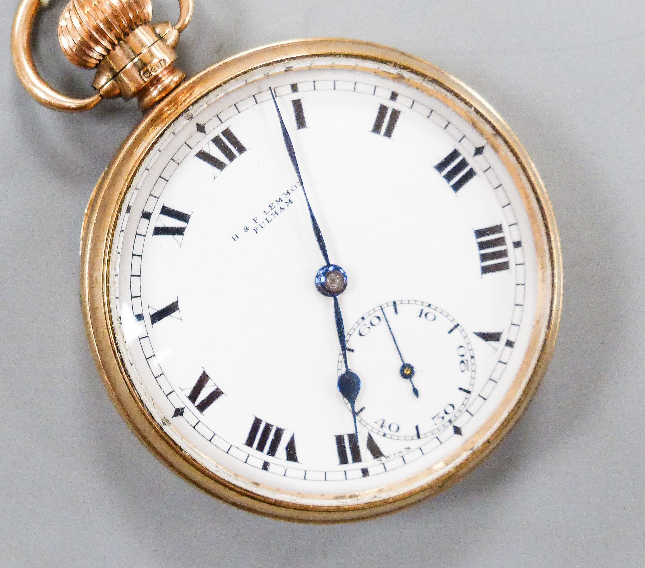 An early 20th century Swiss 9ct gold open faced keyless pocket watch, movement signed Record W. Co, case diameter 48mm, gross weight 77.6 grams.